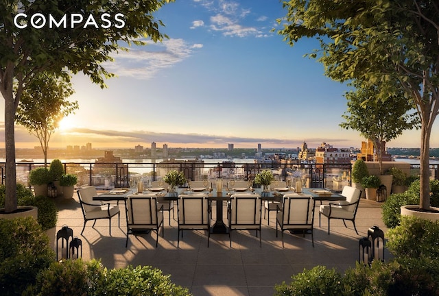 view of patio terrace at dusk