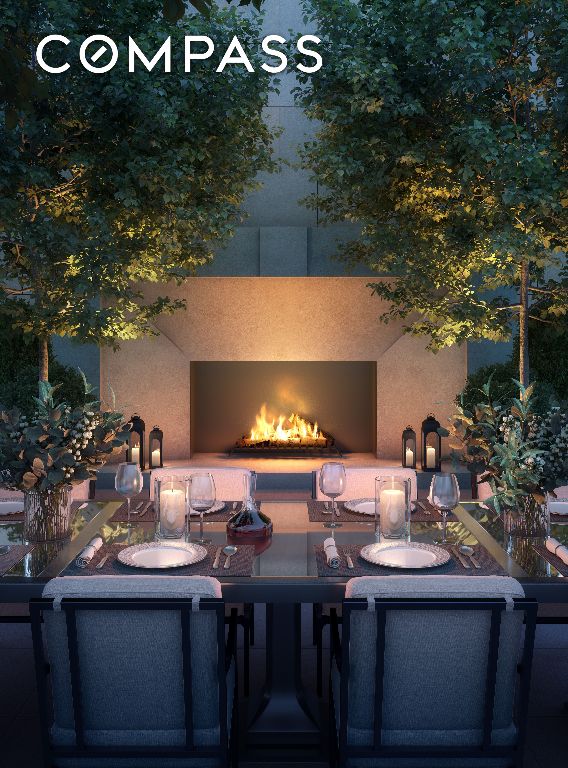 view of patio featuring an outdoor fireplace