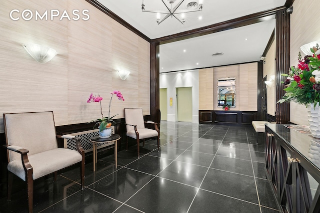 166 E 63rd St Unit 7E, New York City, NY 10065 - lobby with ornamental molding and recessed lighting