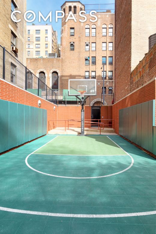 view of sport court featuring community basketball court and fence