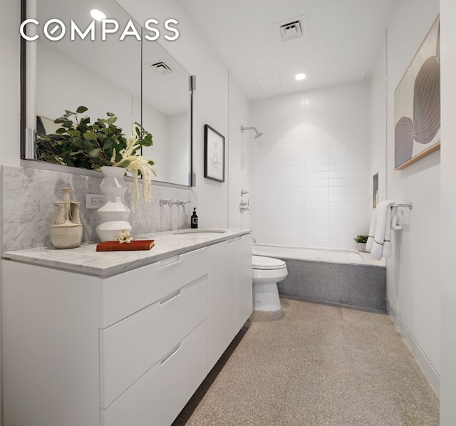 145 Hudson St Unit 7B, New York City, NY 10013 - full bath featuring vanity, tasteful backsplash, tiled shower / bath combo, and recessed lighting