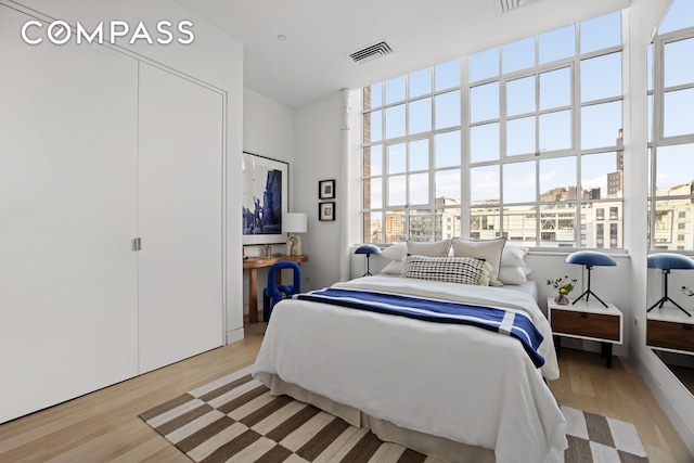 145 Hudson St Unit 7B, New York City, NY 10013 - bedroom featuring light wood finished floors