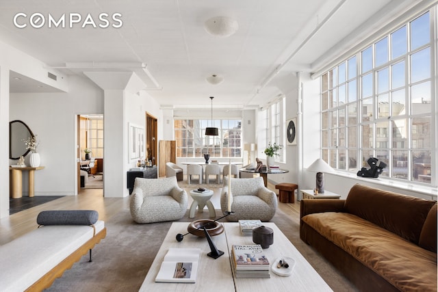 145 Hudson St Unit 7B, New York City, NY 10013 - living area featuring wood finished floors