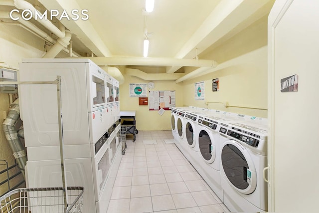 9801 Shore Rd Unit 2B, New York City, NY 11209 - community laundry featuring stacked washing machine and dryer, washer and clothes dryer, and light tile patterned floors