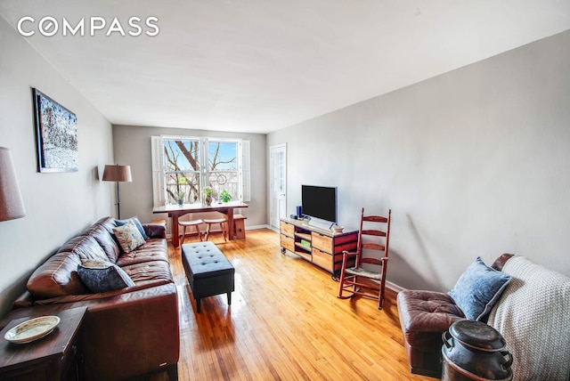 9801 Shore Rd Unit 2B, New York City, NY 11209 - living room with light wood-style floors and baseboards