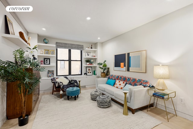 living room featuring visible vents and recessed lighting