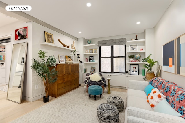 sitting room with light wood-type flooring