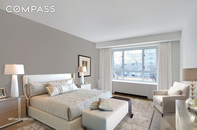 bedroom featuring light hardwood / wood-style flooring