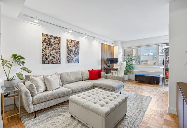 living room featuring rail lighting