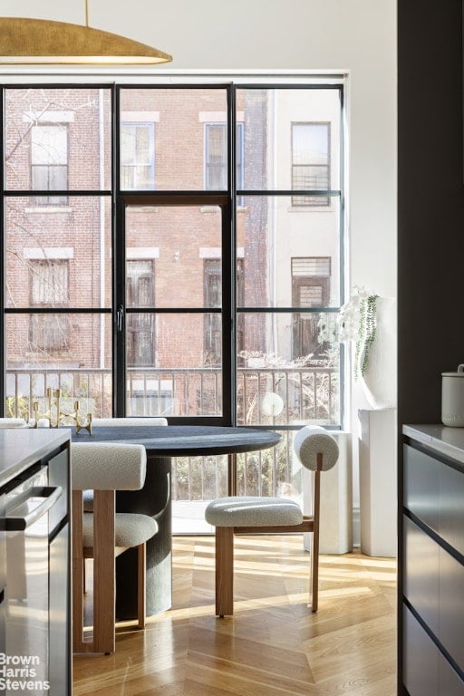 dining area with wood-type flooring