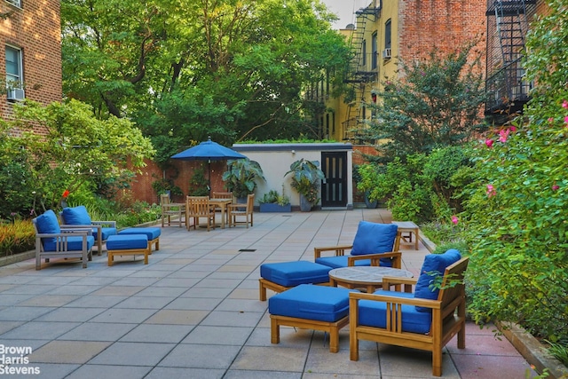 view of patio / terrace featuring an outdoor hangout area and outdoor dining area
