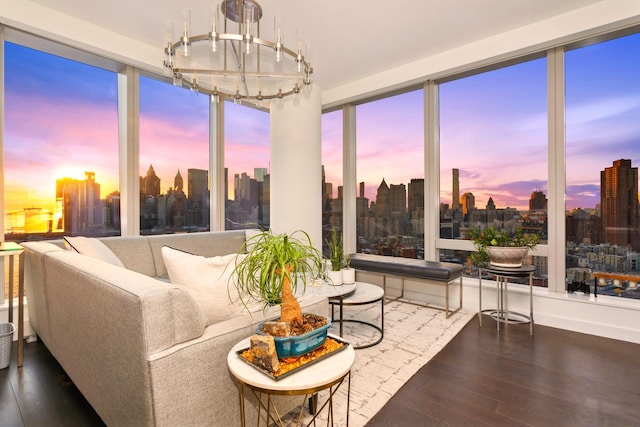 250 S St S Unit 27M, New York City, NY 10002 - living room with a skyline view, wood finished floors, and a chandelier