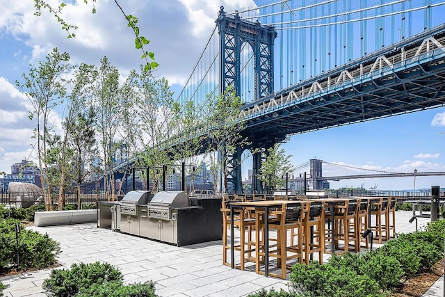 250 S St S Unit 27M, New York City, NY 10002 - view of patio featuring a water view