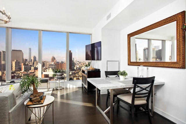 250 S St S Unit 27M, New York City, NY 10002 - dining area with wood finished floors and baseboards