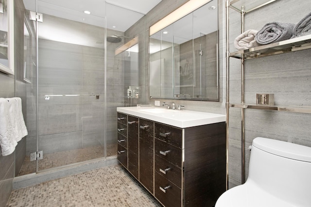 250 S St S Unit 27M, New York City, NY 10002 - full bathroom with vanity, toilet, a stall shower, recessed lighting, and tile walls