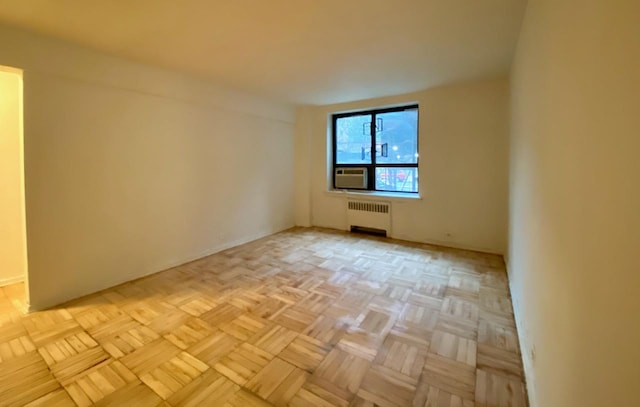37 Nagle Ave Unit 1-C, New York City, NY 10040 - empty room featuring radiator heating unit
