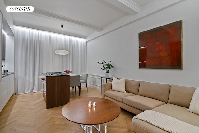 living area featuring visible vents and beam ceiling