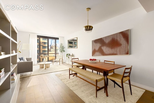 dining room with hardwood / wood-style floors