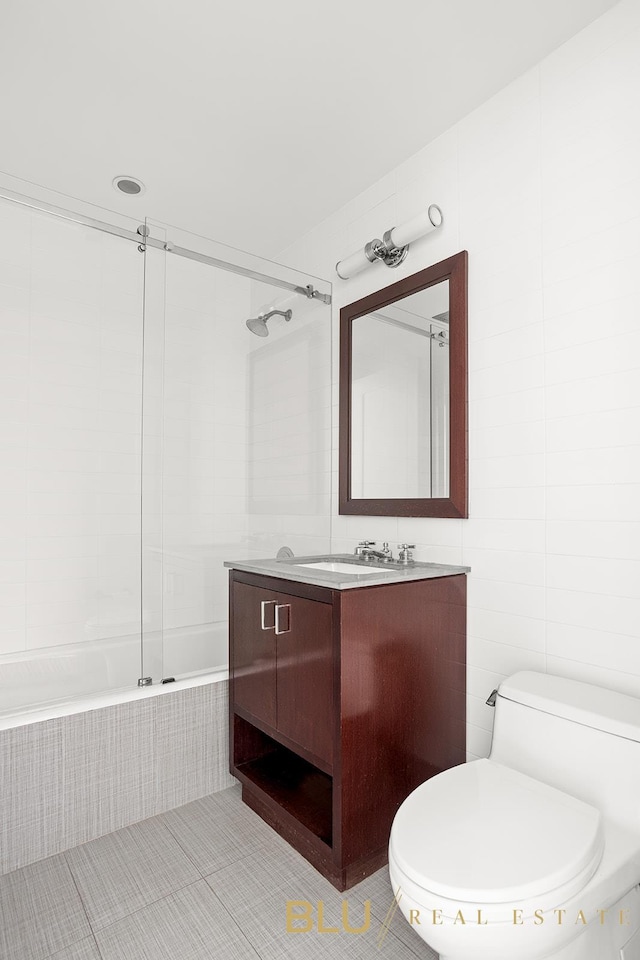 100 Riverside Blvd Unit 7-H, New York City, NY 10069 - full bath with toilet, vanity, tiled shower / bath, and tile patterned flooring