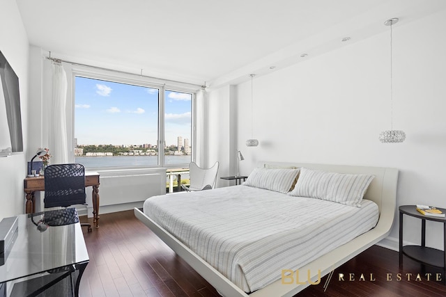 100 Riverside Blvd Unit 7-H, New York City, NY 10069 - bedroom featuring dark wood-style floors and a water view