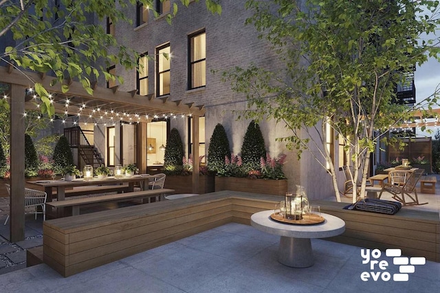 view of patio featuring outdoor dining space, stairway, and a pergola