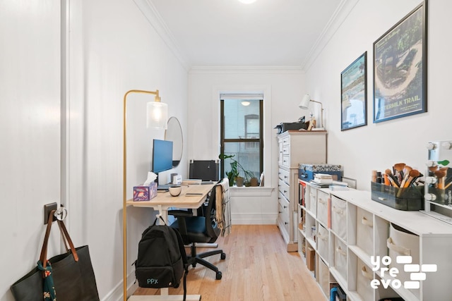 office area featuring ornamental molding, light wood-style floors, and baseboards