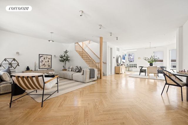 living room with light parquet flooring