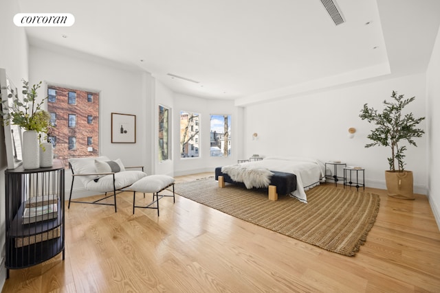 bedroom with light hardwood / wood-style floors