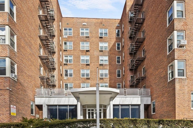 view of building exterior featuring cooling unit