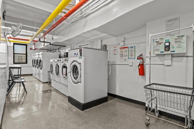 washroom with washing machine and dryer