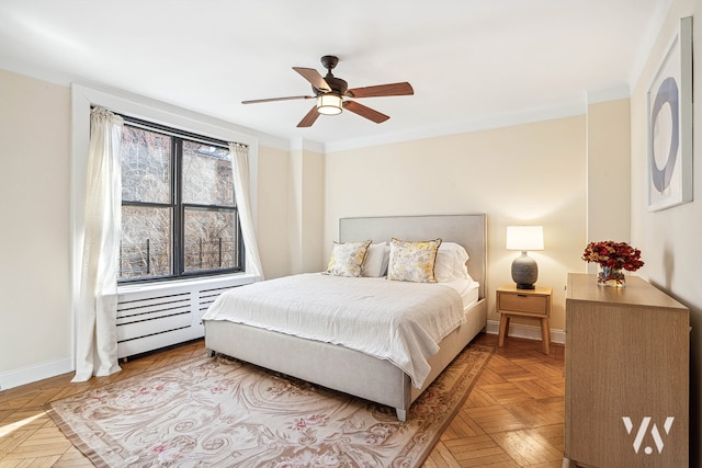 bedroom featuring baseboards and a ceiling fan