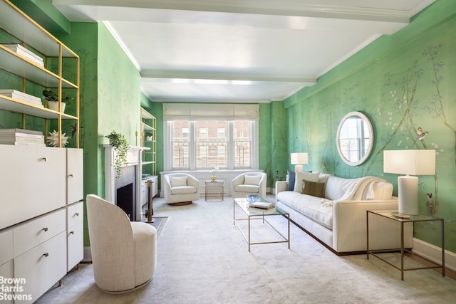 living area featuring wallpapered walls, baseboards, crown molding, carpet floors, and a fireplace