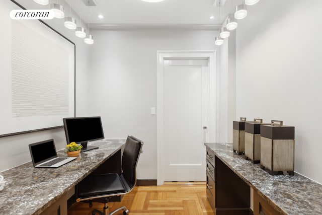 home office featuring built in desk and light parquet floors