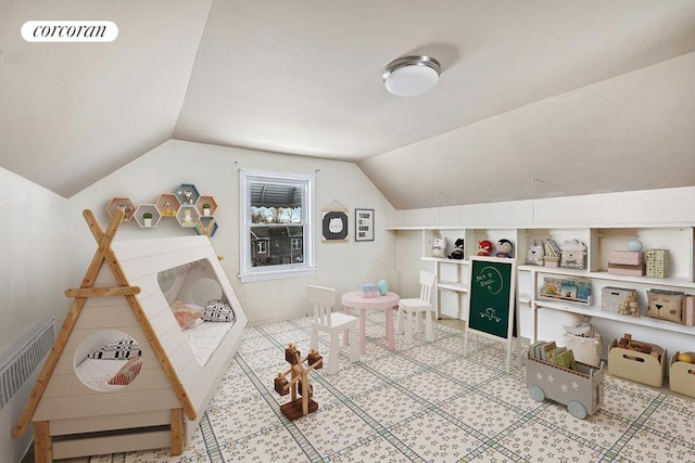 playroom featuring lofted ceiling and visible vents