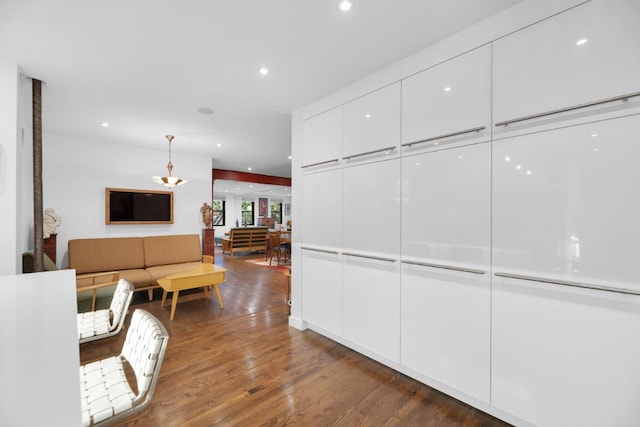 hall with dark hardwood / wood-style flooring