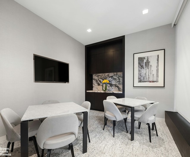 dining room featuring recessed lighting