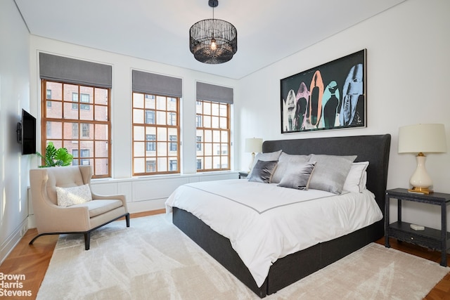 bedroom featuring light wood finished floors