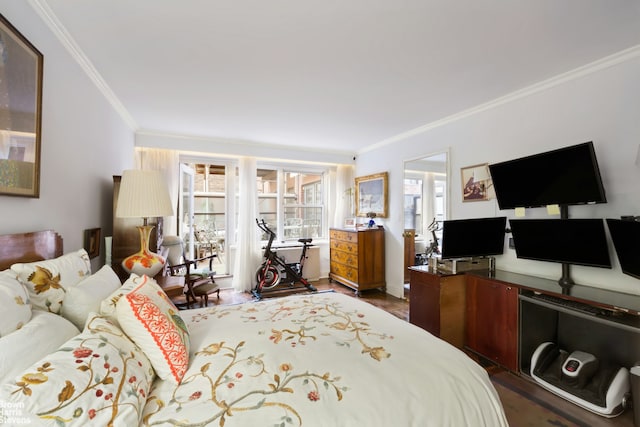 bedroom with ornamental molding and dark wood-type flooring