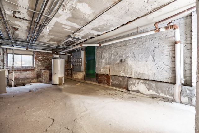 basement with water heater and heating unit