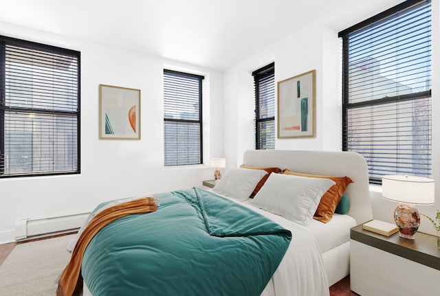 bedroom with a baseboard radiator