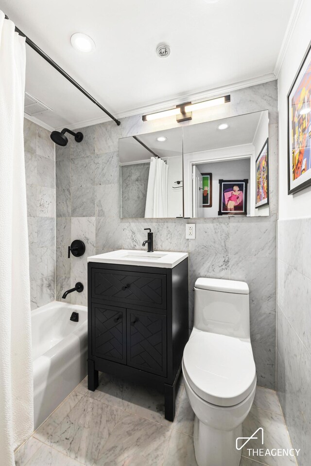 full bath featuring crown molding, tile walls, marble finish flooring, vanity, and shower / bathtub combination with curtain