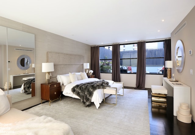 bedroom with light hardwood / wood-style floors