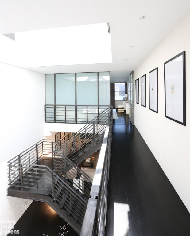 corridor featuring hardwood / wood-style flooring