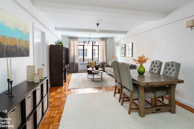 dining room with an inviting chandelier, light parquet flooring, and beamed ceiling