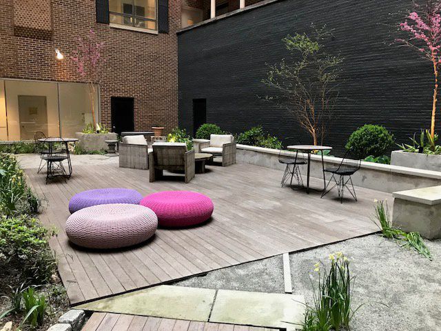 view of patio with an outdoor living space and a wooden deck