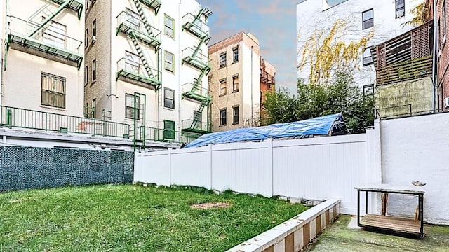 view of yard featuring fence