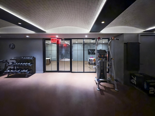959 1st Ave Unit 15D, New York City, NY 10022 - exercise room featuring vaulted ceiling and recessed lighting