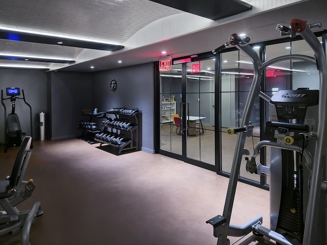 959 1st Ave Unit 15D, New York City, NY 10022 - workout area with lofted ceiling and recessed lighting