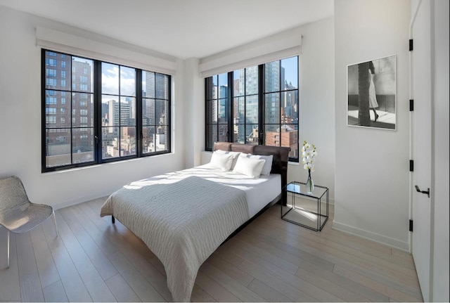 bedroom featuring hardwood / wood-style flooring