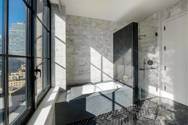 959 1st Ave Unit 15D, New York City, NY 10022 - bathroom featuring a stall shower and a garden tub